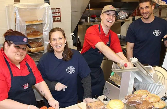 Jersey Mike's employees smiling at camera