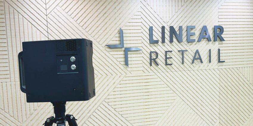 Matterport camera in front of Linear Retail logo